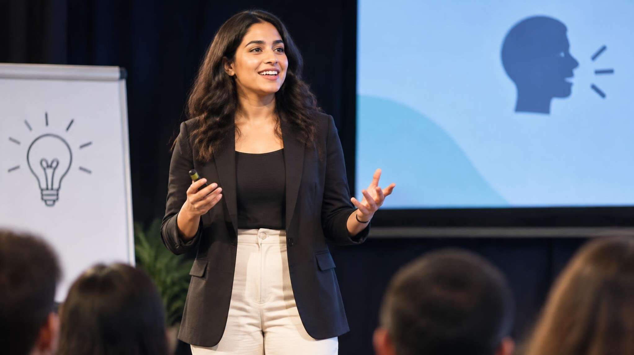 person speaking confidently on stage