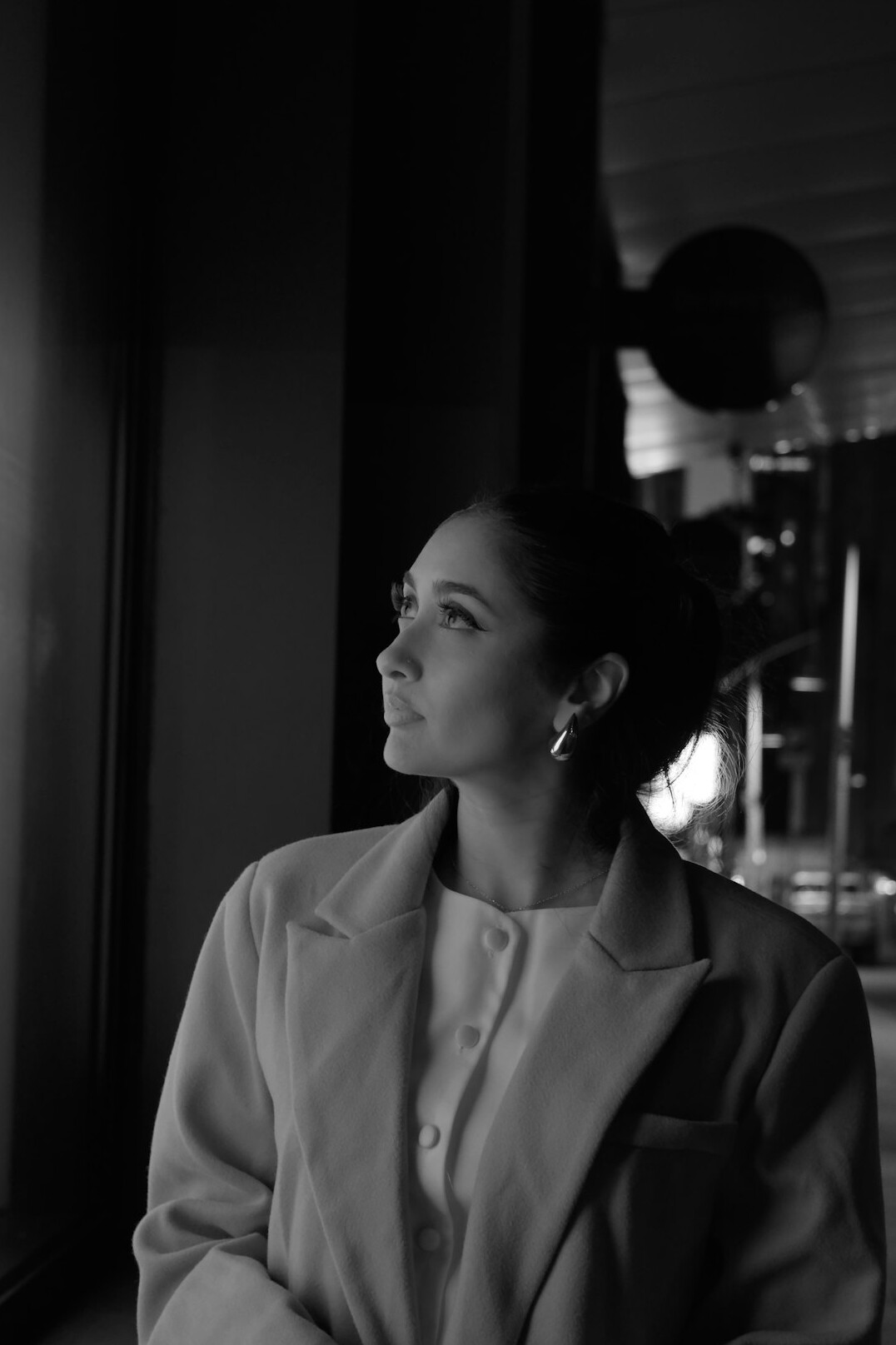 Portrait of a smiling woman in a blazer